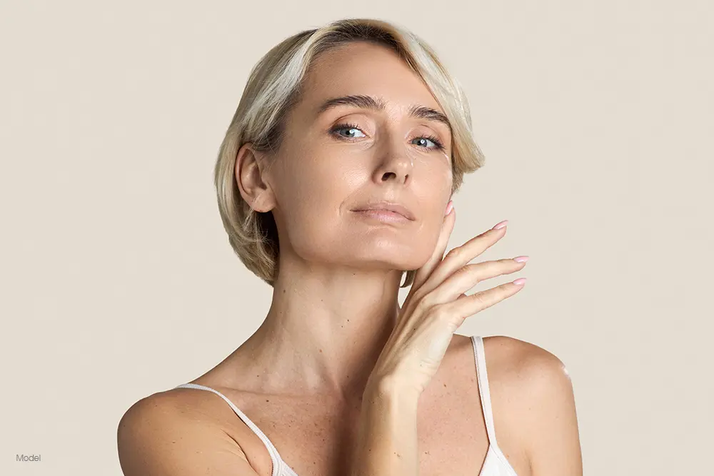 Mature woman with short blonde hair